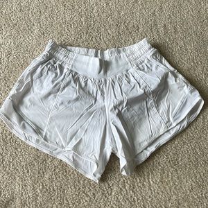 Lululemon Hotty Hot shorts low-rise 4 in. Color is white.